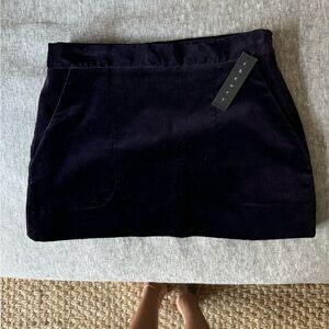 purple velvet mini skirt. NWT !